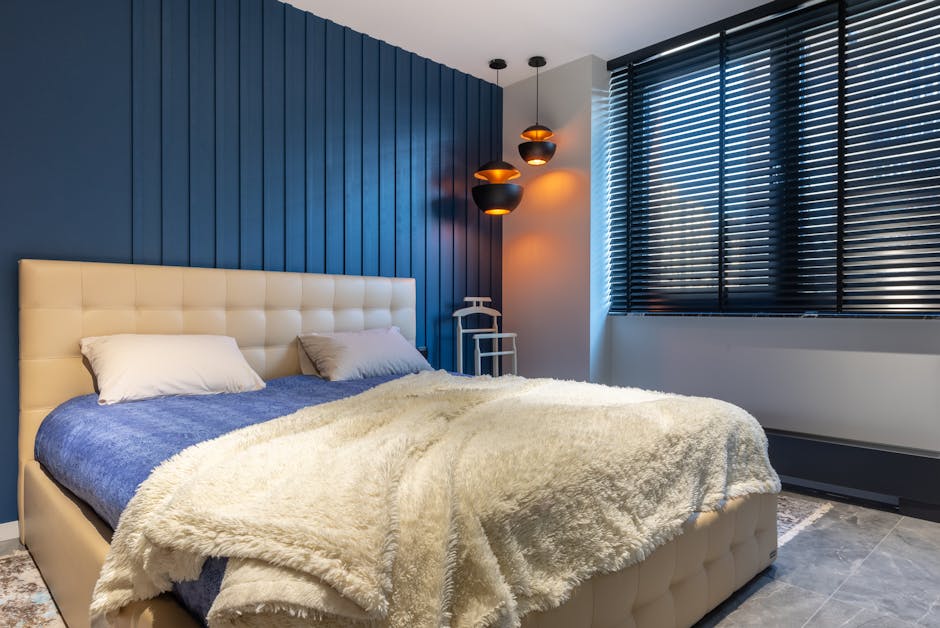 Cozy bedroom featuring modern blackout window shades