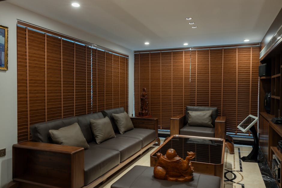 Modern living room with custom window blinds and elegant natural lighting